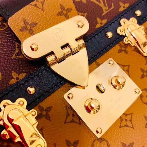 louis vuitton handbag hardware protectors.